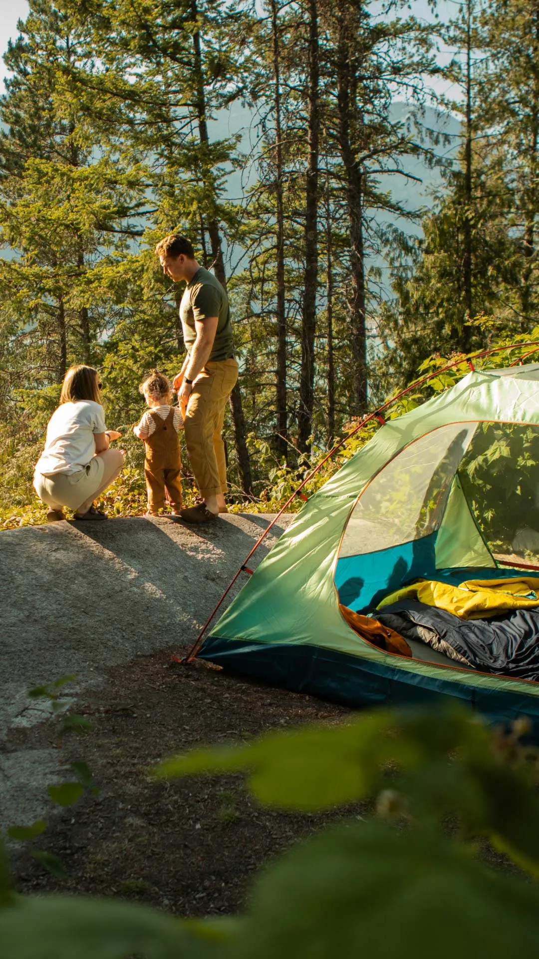 family camping with a view of the ocean