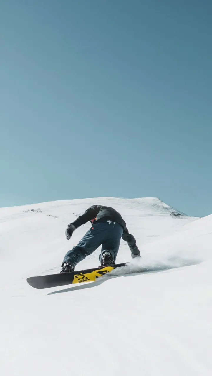 A snowboarder on a mountain